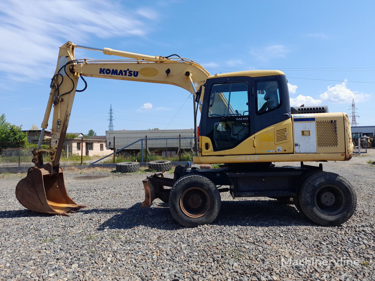 Komatsu PW130-7K excavadora de ruedas